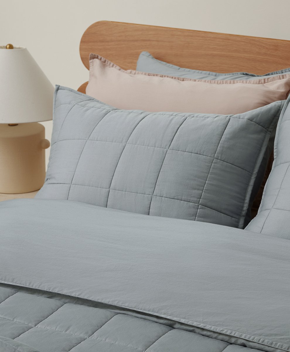 A BLUE PILLOW COVER